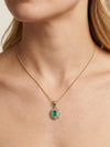 Auksinis pakabukas su ovaliu smaragdu ir briliantais