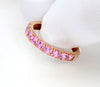 Red gold ring with pink sapphires