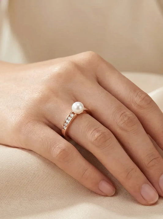 Rose gold ring with pearl and zircons