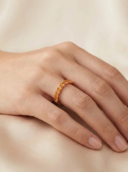 Red gold ring with orange sapphires