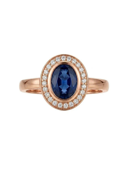 Золотое кольцо с синим камнем и цирконами