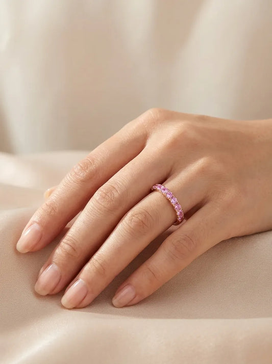 Red gold ring with pink sapphires