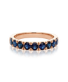 Red gold ring with blue sapphires