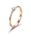 Red gold ring with a round diamond 0.05 ct.