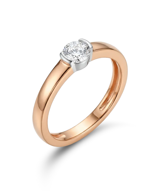 Red and white gold ring with a central zircon 