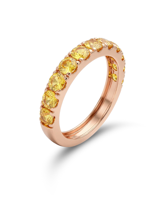 Red gold ring with yellow sapphires