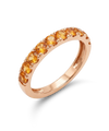 Red gold ring with orange sapphires