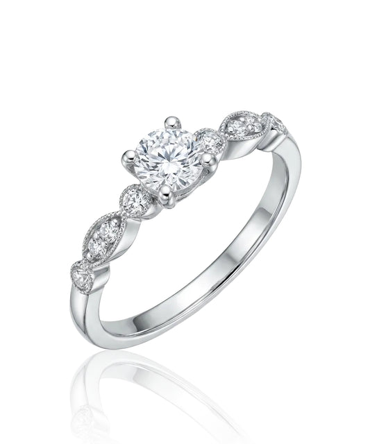 Alto gold ring with central zircon and decorative eyelets